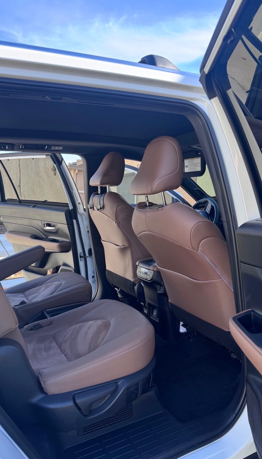 Detailed brown leather SUV seats and cabin